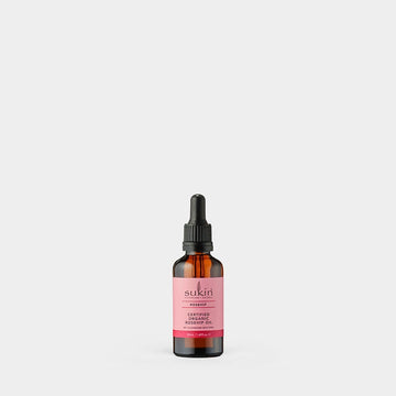 Sukin rosehip oil bottle on a white background
