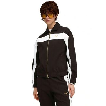 Person wearing a black and white tracksuit with a brand logo on a white background