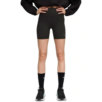 Person wearing black athletic shorts and socks on a white background