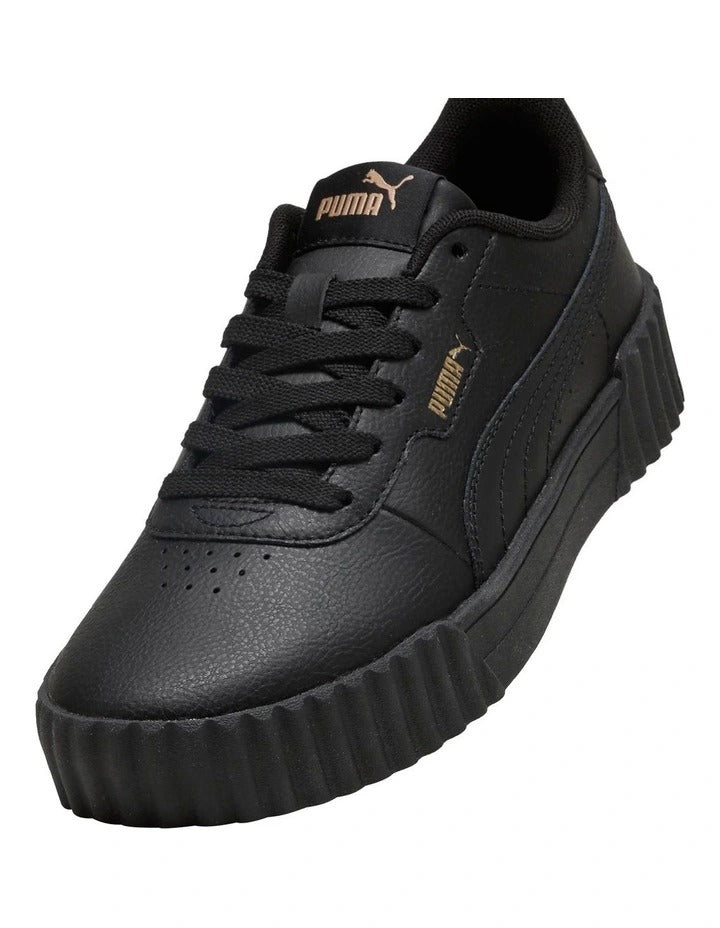 Black Puma sneaker on a white background