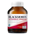 Blackmores Vitamin E 1000IU 100 Capsules bottle front view, featuring a green and gold design, showcasing the product's label and packaging.