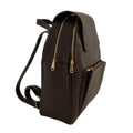 Dark brown genuine leather women's backpack by LeatherLuxe with sleek design, premium finish, and spacious compartments.