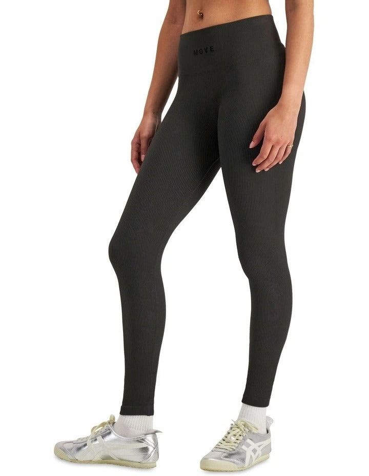 Move Rib Seamless Legging in stretchy ribbed nylon elastane fabric with ankle length, no-roll waistband, and sweat-wicking finish for active comfort
