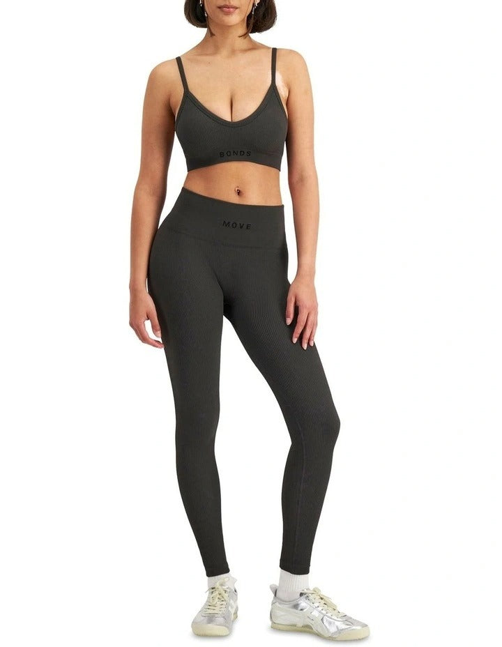 Move Rib Seamless Legging in stretchy ribbed nylon elastane fabric with ankle length, no-roll waistband, and sweat-wicking finish for active comfort
