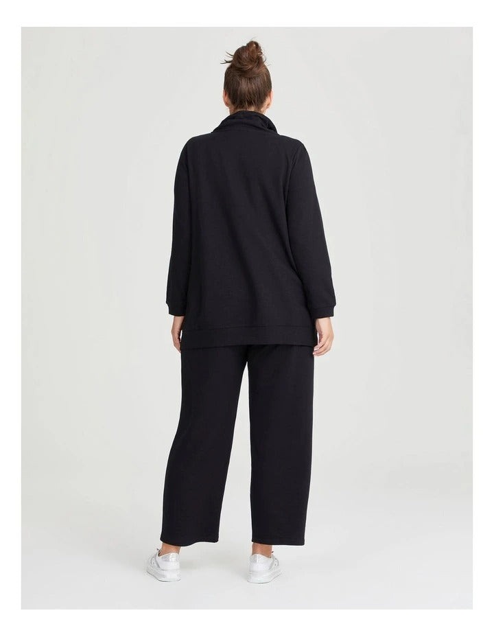 Taking Shape Funnel Neck Active Tunic in Black with long sleeves, half zip, kangaroo pocket, and ribbed details for plus size comfort.