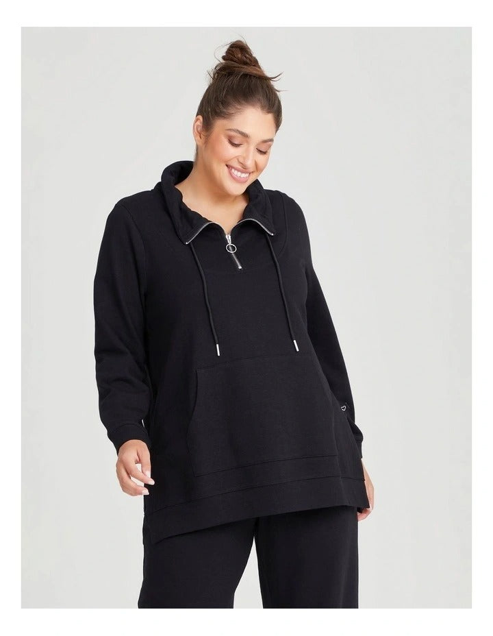 Taking Shape Funnel Neck Active Tunic in Black with long sleeves, half zip, kangaroo pocket, and ribbed details for plus size comfort.