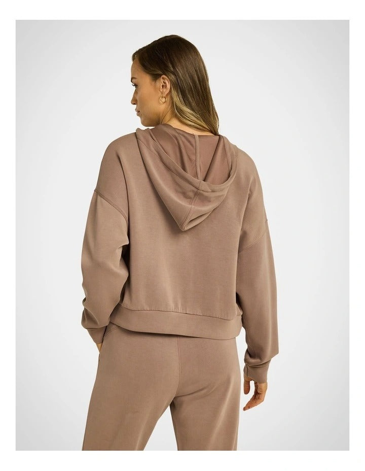 Rockwear Travel Half Zip Hoodie in Coffee, women's relaxed fit hoodie with external pocket and ultra-smooth fabric for comfort and style during travel.