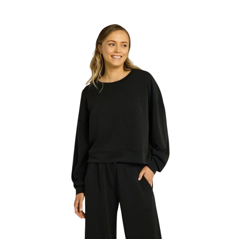 Rockwear Travel Hip Length Crew Jumper in Black, women's cozy crew neck sweater with relaxed fit and ultra-smooth fabric, perfect for travel and everyday wear.