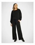 Rockwear Travel Hip Length Crew Jumper in Black, women's cozy crew neck sweater with relaxed fit and ultra-smooth fabric, perfect for travel and everyday wear.
