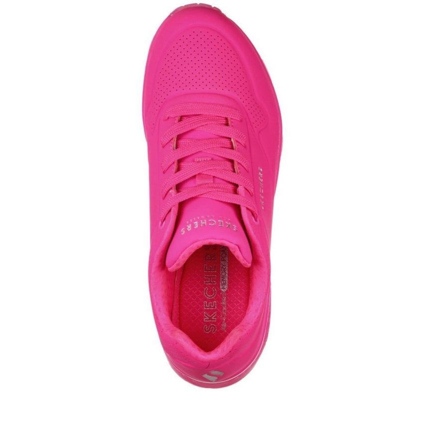Skechers Uno Neon Nights sneaker in hot pink lifestyle view