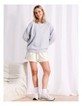 Relaxed fit crew neck top, 57% cotton, 38% modal, 5% elastane, worn by model 177cm, size 8.