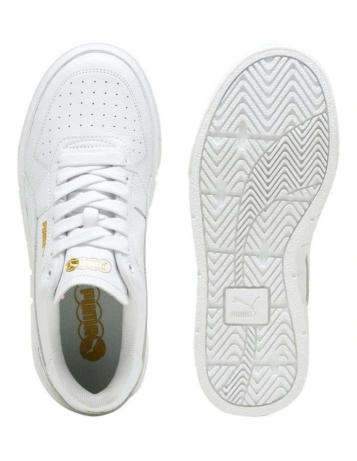 Puma Cali Court Women’s Sneakers with leather and synthetic upper, flat sole, and sporty streetwear design in a classic court-inspired silhouette.