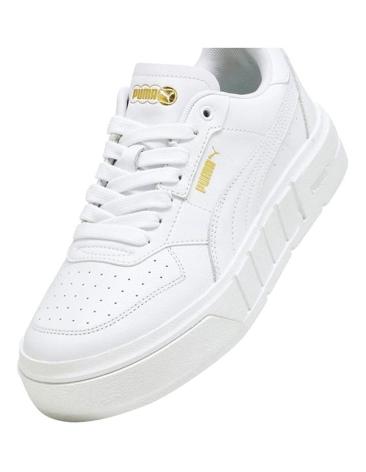 Puma Cali Court Women’s Sneakers with leather and synthetic upper, flat sole, and sporty streetwear design in a classic court-inspired silhouette.
