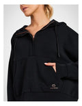 Rockwear Travel Half Zip Hoodie in Black, women's relaxed fit hoodie with side pockets and ultra-smooth fabric, perfect for travel and everyday wear.