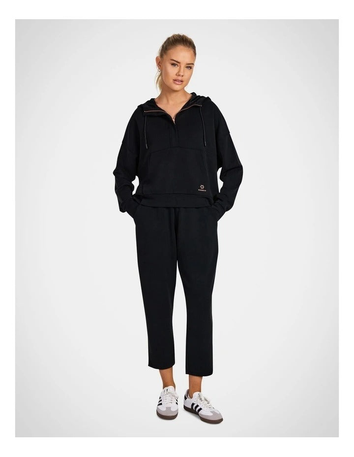 Rockwear Travel Half Zip Hoodie in Black, women's relaxed fit hoodie with side pockets and ultra-smooth fabric, perfect for travel and everyday wear.