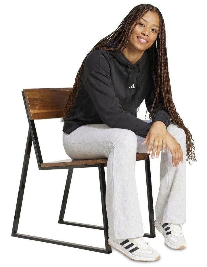 Adidas Essentials Small Logo French Terry Hoodie in Black with soft cotton blend and chest 3 Bar Logo