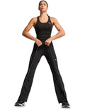 Puma Train All Day Essential 2-in-1 Women’s Tank with moisture-wicking dryCELL technology, 85% recycled polyester, 15% elastane