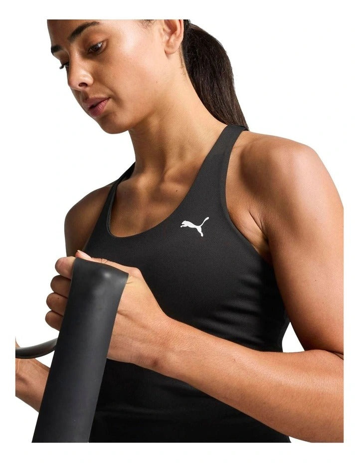 Puma Train All Day Essential 2-in-1 Women’s Tank with moisture-wicking dryCELL technology, 85% recycled polyester, 15% elastane