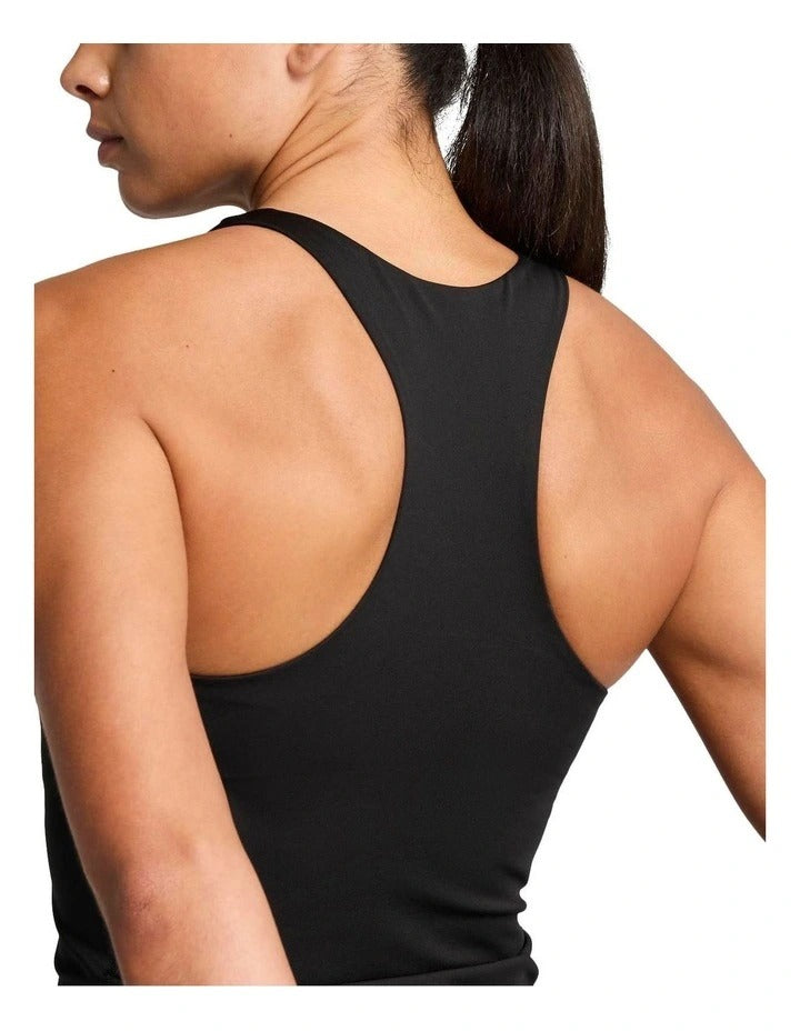 Puma Train All Day Essential 2-in-1 Women’s Tank with moisture-wicking dryCELL technology, 85% recycled polyester, 15% elastane