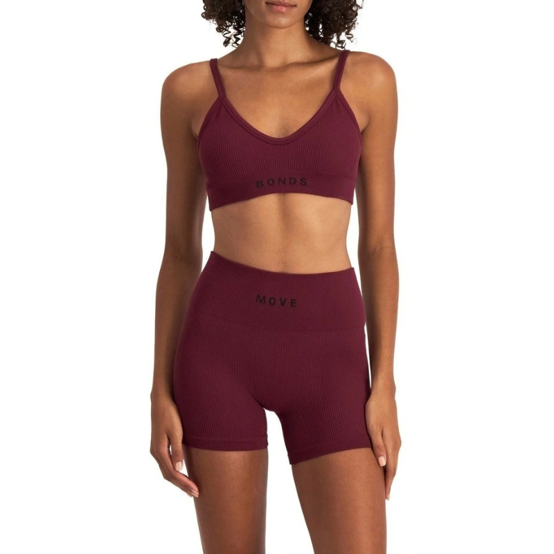Women's Move Rib Seamless Crop Bra in ribbed fabric with removable cups, soft vee neckline, and supportive underbust elastic.