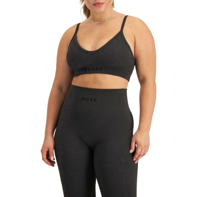 Move Rib Seamless Crop in ribbed nylon elastane with removable cups, soft vee neckline, moisture-wicking finish, and supportive underbust elastic
