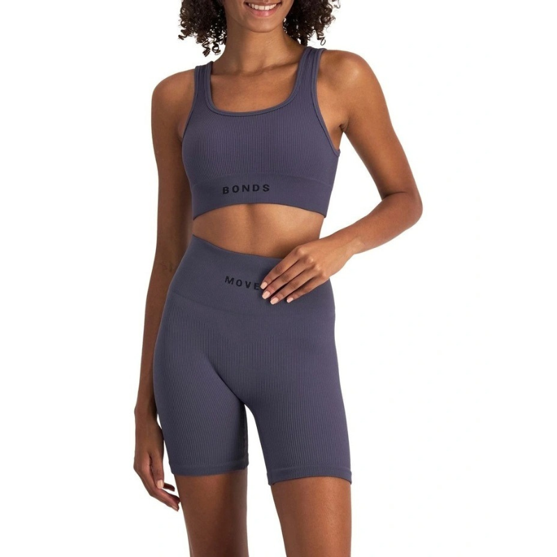 Move Rib Seamless Crop in ribbed nylon elastane fabric with removable cups, soft scoop neckline, and sweat-wicking finish for low-impact activities