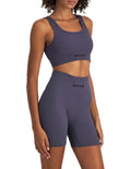 Move Rib Seamless Crop in ribbed nylon elastane fabric with removable cups, soft scoop neckline, and sweat-wicking finish for low-impact activities