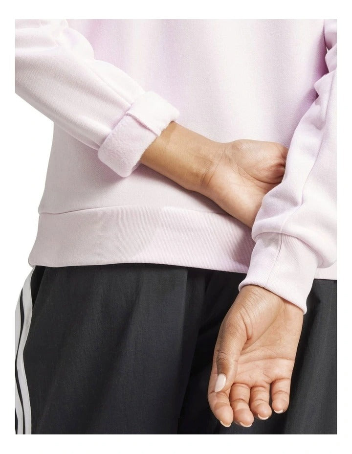Adidas Essentials Feel Cozy Hoodie in pink cotton polyester blend with 3 Bar Logo on chest