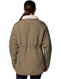 Columbia Birchwood II Quilted Jacket in Stone Green with Sherpa-lined interior, water-resistant shell, and zippered hand pockets
