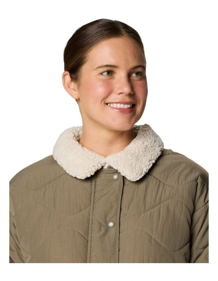 Columbia Birchwood II Quilted Jacket in Stone Green with Sherpa-lined interior, water-resistant shell, and zippered hand pockets