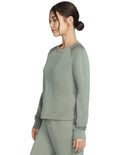 Skechers Skechluxe Elevate Crewneck in Green LT152 TPOL – Women’s soft crewneck top made with Skechweave Elevate fabric, relaxed fit, and stylish comfort