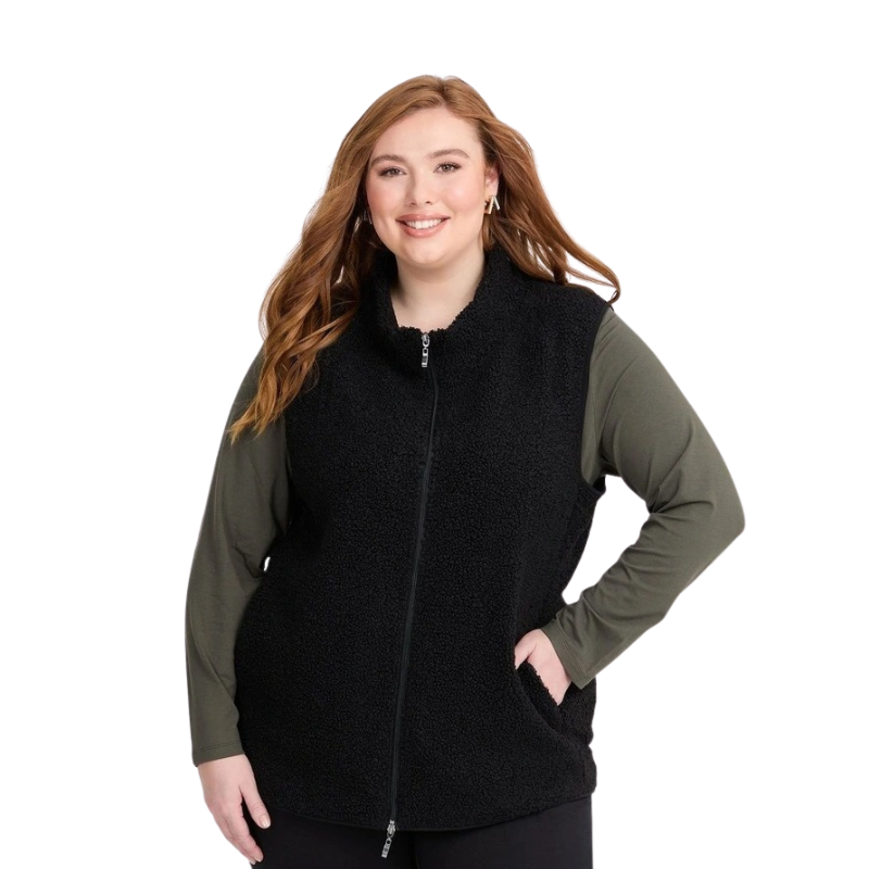 Taking Shape Teddy Vest in Black with plush teddy fabric, zip closure, high neckline, and side pockets for plus size comfort and layering.