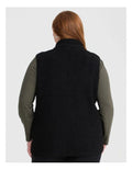 Taking Shape Teddy Vest in Black with plush teddy fabric, zip closure, high neckline, and side pockets for plus size comfort and layering.