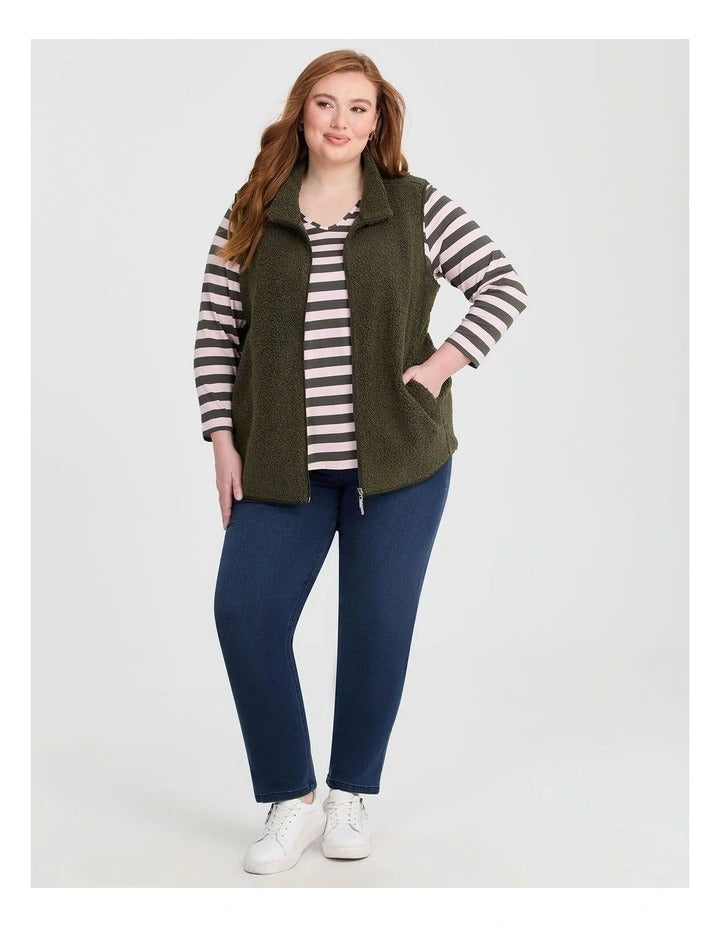 Taking Shape Teddy Vest in Olive with plush teddy fabric, zip closure, high neckline, and side pockets for plus size layering and winter style.