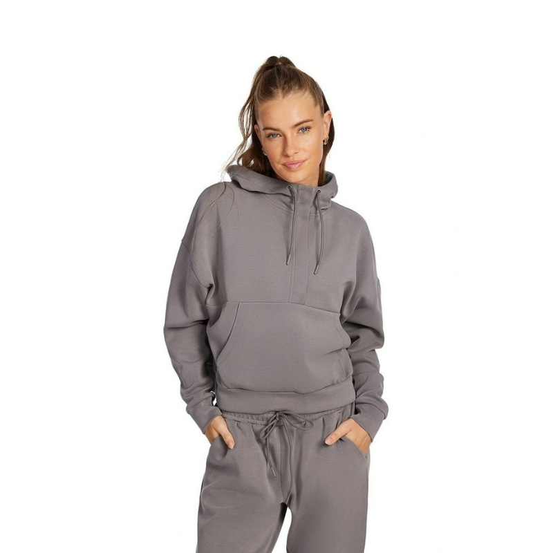 Rockwear Travel Hip Half Zip Hoodie in Almond, women's cozy hoodie with front pockets, relaxed fit, and hip-length silhouette for comfort and style.