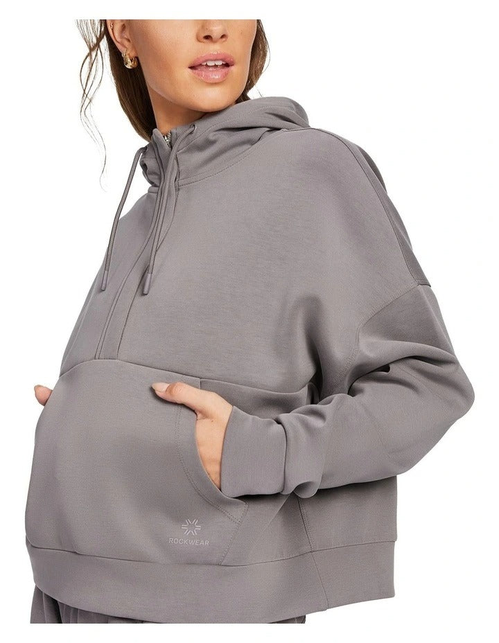 Rockwear Travel Hip Half Zip Hoodie in Almond, women's cozy hoodie with front pockets, relaxed fit, and hip-length silhouette for comfort and style.