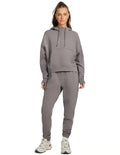Rockwear Travel Hip Half Zip Hoodie in Almond, women's cozy hoodie with front pockets, relaxed fit, and hip-length silhouette for comfort and style.