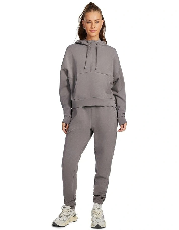Rockwear Travel Hip Half Zip Hoodie in Almond, women's cozy hoodie with front pockets, relaxed fit, and hip-length silhouette for comfort and style.