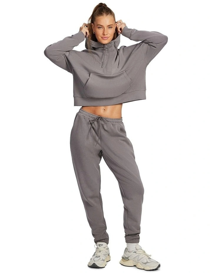 Rockwear Travel Hip Half Zip Hoodie in Almond, women's cozy hoodie with front pockets, relaxed fit, and hip-length silhouette for comfort and style.