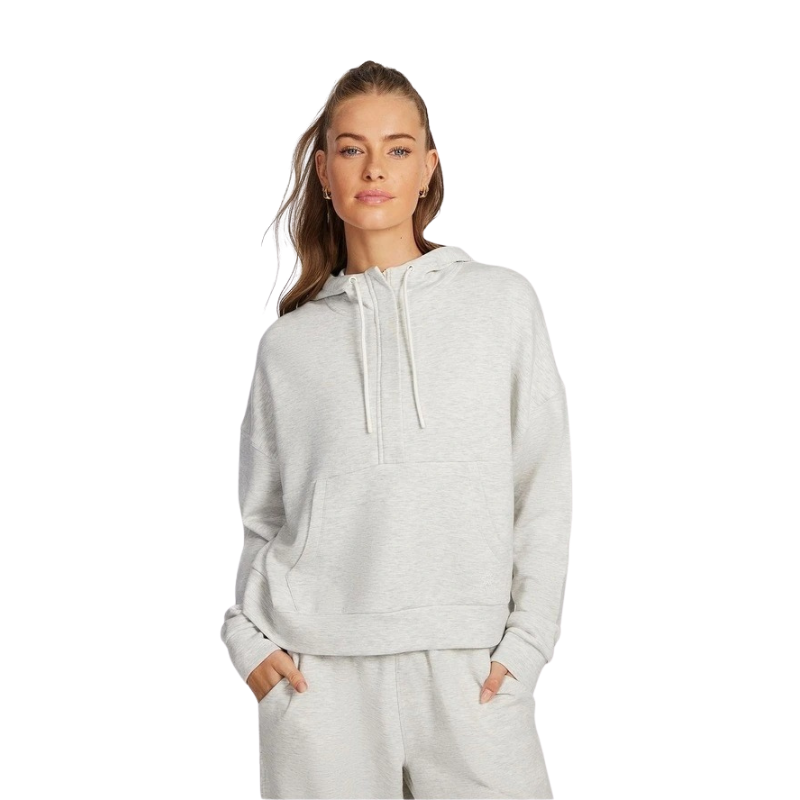 Rockwear Travel Hip Half Zip Hoodie in Grey, featuring a cozy hood and front pockets for a relaxed, stylish fit.
