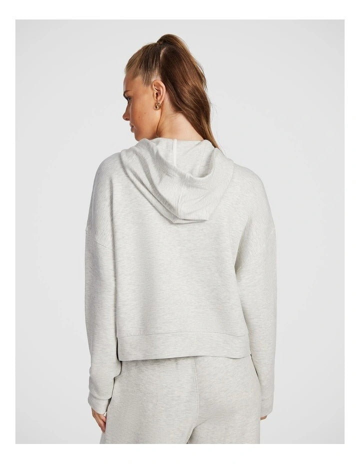 Rockwear Travel Hip Half Zip Hoodie in Grey, featuring a cozy hood and front pockets for a relaxed, stylish fit.