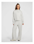 Rockwear Travel Hip Half Zip Hoodie in Grey, featuring a cozy hood and front pockets for a relaxed, stylish fit.