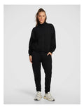 Rockwear Travel Zip Through in Black featuring cozy funnel neck and side pockets for stylish cold-weather wear.