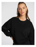 Rockwear Travel Hip Length Crew Sweater in Black, women’s relaxed fit, long sleeve sweater for everyday comfort and style.