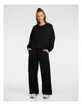 Rockwear Travel Hip Length Crew Sweater in Black, women’s relaxed fit, long sleeve sweater for everyday comfort and style.