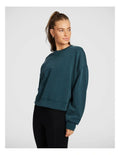 Rockwear Travel Hip Length Crew Sweater in Midnight Green, offering a cozy and relaxed fit for everyday comfort.