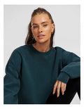 Rockwear Travel Hip Length Crew Sweater in Midnight Green, offering a cozy and relaxed fit for everyday comfort.