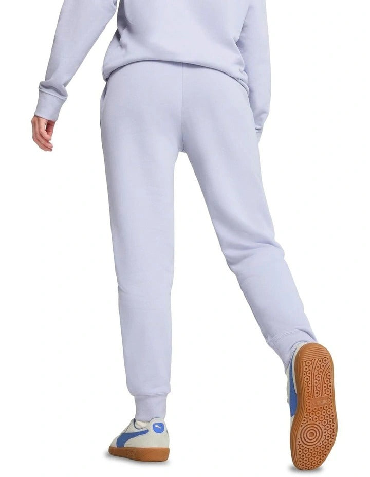 Light purple sweatshirt and pants with white and blue shoes on a white background