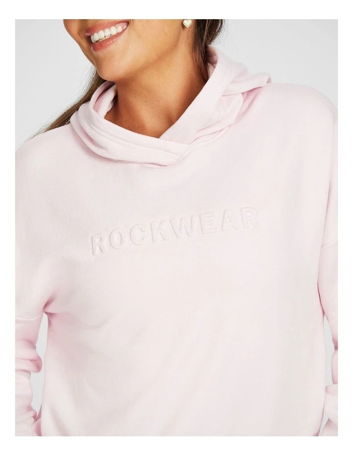 Rockwear Plush Fleece Hoodie in Pink Gin, women’s cozy fleece hoodie with relaxed fit, hip-length design, and soft fabric for comfort during workouts or casual wear.