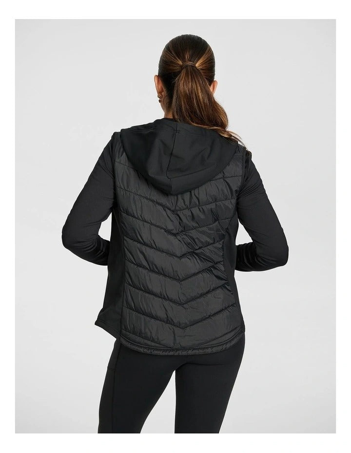 Rockwear Warm All Ways Vest in Black with cozy hood and chevron stitched panels.